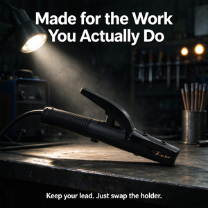 A black welding clamp tool resting on a workbench in a workshop setting, with a spotlight shining on it. Large overlaid text reads 'Made for the Work You Actually Do' and smaller text at the bottom says 'Keep your lead.